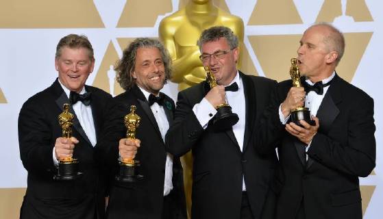 (L-R) Visual effects artists Richard R. Hoover, Paul Lambert, Gerd Nefzer, and John Nelson, winners of the award for Best Visual Effects award for Blade Runner 2049, appear backstage with their Oscars during the 90th annual Academy Awards at Loews Hollywood Hotel in the Hollywood section of Los Angeles on March 4, 2018.  LAP201803041023 JIMxRUYMEN
