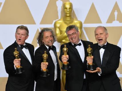 (L-R) Visual effects artists Richard R. Hoover, Paul Lambert, Gerd Nefzer, and John Nelson, winners of the award for Best Visual Effects award for Blade Runner 2049, appear backstage with their Oscars during the 90th annual Academy Awards at Loews Hollywood Hotel in the Hollywood section of Los Angeles on March 4, 2018.  LAP201803041024 JIMxRUYMEN