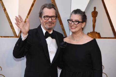 March 4, 2018 - Los Angeles, California, U.S. - GARY OLDMAN and his wife GISELE SCHMIDT arrives on the red carpet for the 90th Annual Academy Awards at the Dolby Theatre. Los Angeles U.S. - ZUMAz03_ 20180304_zbp_z03_166 Copyright: xKevinxSullivanx