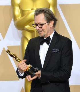 Actor Gary Oldman, winner of the award for Best Actor award for Darkest Hour, appears backstage with his Oscar during the 90th annual Academy Awards at Loews Hollywood Hotel in the Hollywood section of Los Angeles on March 4, 2018.  LAP201803041130 JIMxRUYMEN