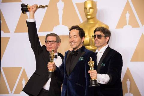 Mar 4, 2018 - Hollywood, California, U.S. - Jeffrey A. Melvin, PAUL DENHAM AUSTERBERRY and Shane Vieau pose backstage with the Oscar for Achievement in production design, for work on The Shape of Water during the live ABC Telecast of The 90th Oscars at the Dolby Theatre in Hollywood. Hollywood U.S. - ZUMAz03_ 20180304_shf_z03_640 Copyright: xMichaelxBakerx