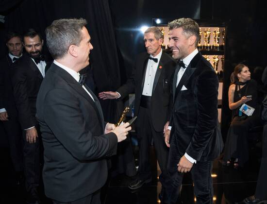 Lee Unkrich, Oscar winner for best animated feature film for work on Coco, and Oscar Isaac chat backstage with the during the live ABC Telecast of The 90th OscarsÂ® at the DolbyÂ® Theatre in Hollywood, CA on Sunday, March 4, 2018.  Copyright: xMattxSaylesx 33546_524PLX