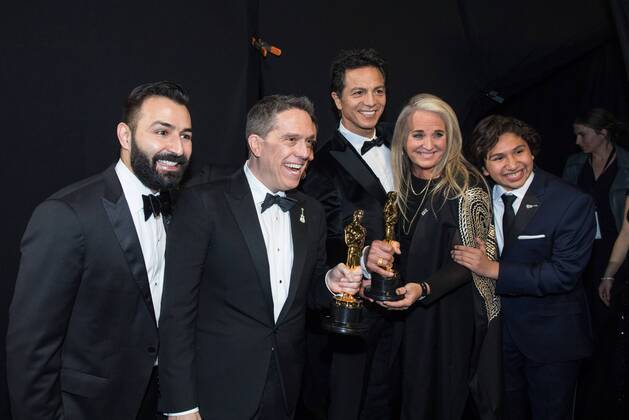 Adrian Molina, Lee Unkrich, Benjamin Bratt, Darla K. Anderson and Anthony Gonzalez pose backstage with the Oscar for best animated feature film for work on Coco during the live ABC Telecast of The 90th OscarsÂ® at the DolbyÂ® Theatre in Hollywood, CA on Sunday, March 4, 2018.  Copyright: xMattxSaylesx 33546_525PLX