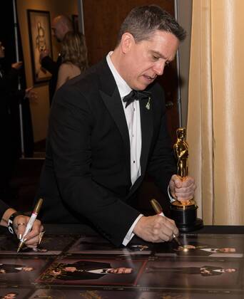 Lee Unkrich signs posters backstage with the Oscar for best animated feature film for work on Coco during the live ABC Telecast of The 90th OscarsÂ® at the DolbyÂ® Theatre in Hollywood, CA on Sunday, March 4, 2018.  Copyright: xRobertxGladdenx 33546_546PLX