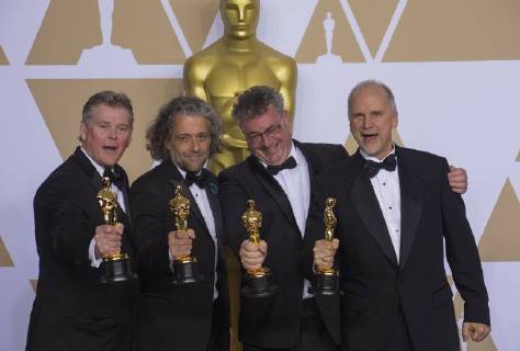 March 4, 2018 - Hollywood, California, U.S - Richard R. Hoover, Paul Lambert, Gerd Nefzer, and John Nelson, winners of the Best Visual Effects award for Blade Runner 2049, pose in the press room during the 90th Annual Academy Awards held at the Loews Hollywood Hotel on Sunday March 4, 2018 in Hollywood, California. Hollywood U.S. - ZUMAp124 20180304_zaa_p124_245 Copyright: xArianaxRuizx