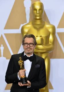 Actor Gary Oldman, winner of the award for Best Actor award for Darkest Hour appears backstage with his Oscar during the 90th annual Academy Awards at Loews Hollywood Hotel in the Hollywood section of Los Angeles on March 4, 2018.  LAP201803041536 JIMxRUYMEN