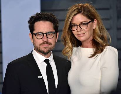 J.J. Abrams (L) and his wife Katie McGrath arrive for the Vanity Fair Oscar Party at the Wallis Annenberg Center for the Performing Arts in Beverly Hills, California on March 4, 2018.  LAP201803043039 CHRISTINExCHEW