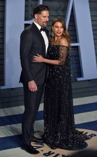 Sofia Vergara (R) and Joe Manganiello arrive for the Vanity Fair Oscar Party at the Wallis Annenberg Center for the Performing Arts in Beverly Hills, California on March 4, 2018.  LAP201803043051 CHRISTINExCHEW
