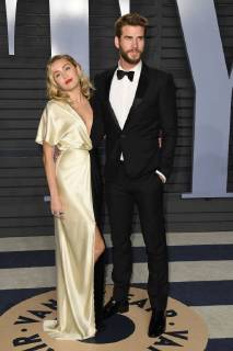 March 4, 2018 - Los Angeles, CA, U.S. - 04 March 2018 - Los Angeles, California - Miley Cyrus, Liam Hemsworth. 2018 Vanity Fair Oscar Party following the 90th Academy Awards held at the Wallis Annenberg Center for the Performing Arts. Photo Credit: AdMedia Los Angeles U.S. - ZUMAa123 20180304_zaa_a123_1294 Copyright: xBirdiexThompsonx