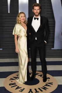 March 4, 2018 - Los Angeles, CA, U.S. - 04 March 2018 - Los Angeles, California - Miley Cyrus, Liam Hemsworth. 2018 Vanity Fair Oscar Party following the 90th Academy Awards held at the Wallis Annenberg Center for the Performing Arts. Photo Credit: AdMedia Los Angeles U.S. - ZUMAa123 20180304_zaa_a123_1288 Copyright: xBirdiexThompsonx