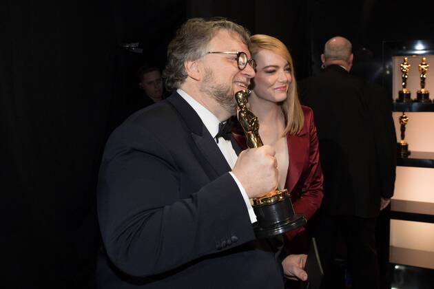 Emma Stone with Guillermo del Toro as he poses backstage with the Oscar for achievement in directing for work on The Shape of Water during the live ABC Telecast of The 90th OscarsÂ® at the DolbyÂ® Theatre in Hollywood, CA on Sunday, March 4, 2018.  Copyright: xMattxSaykesx 33546_776PLX
