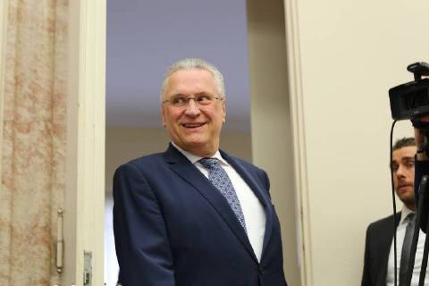 April 5, 2018 - Munich, Bavaria, Germany - Joachim Herrmann enters the room, in Munich, Germany, on April 5, 2018. The minister of interiour Joachim Herrmann and the President of the Verfassungsschutz ( Secret Service). They talked about Islamism, Right-wing extremism, left-wing extremism and cyber crminality. Munich Germany - ZUMAn230 20180405_zaa_n230_090 Copyright: xAlexanderxPohlx