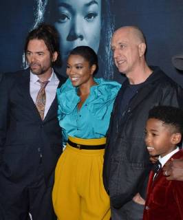 Cast members Billy Burke, Gabrielle Union and Seth Carr (L-R) join director James McTeigue (3rd-L) on the carpet for a photo-op during the special screening of the motion picture thriller Breaking In at the ArcLight Cinema Dome in the Hollywood section of Los Angeles on May 1, 2018. Storyline: A woman fights to protect her family during a home invasion.  LAP2018050128 JIMxRUYMEN