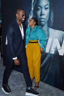 Cast member Gabrielle Union and her husband, NBA player Dwayne Wade attend the special screening of the motion picture thriller Breaking In at the ArcLight Cinema Dome in the Hollywood section of Los Angeles on May 1, 2018. Storyline: A woman fights to protect her family during a home invasion.  LAP2018050135 JIMxRUYMEN