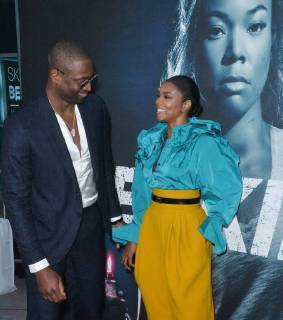 Cast member Gabrielle Union and her husband, NBA player Dwayne Wade attend the special screening of the motion picture thriller Breaking In at the ArcLight Cinema Dome in the Hollywood section of Los Angeles on May 1, 2018. Storyline: A woman fights to protect her family during a home invasion.  LAP2018050137 JIMxRUYMEN