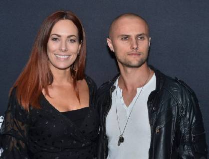 Cast member Mark Furze (R) and Laural Barrett attend the special screening of the motion picture thriller Breaking In at the ArcLight Cinema Dome in the Hollywood section of Los Angeles on May 1, 2018. Storyline: A woman fights to protect her family during a home invasion.  LAP2018050140 JIMxRUYMEN