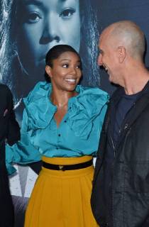 Cast member Gabrielle Union and director James McTeigue mingle on the carpet during the special screening of the motion picture thriller Breaking In at the ArcLight Cinema Dome in the Hollywood section of Los Angeles on May 1, 2018. Storyline: A woman fights to protect her family during a home invasion.  LAP2018050199 JIMxRUYMEN