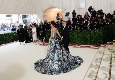 Amal Clooney and George Clooney arrive on the red carpet at The Metropolitan Museum of Art s Costume Institute Benefit Heavenly Bodies: Fashion and the Catholic Imagination at Metropolitan Museum of Art in New York City on May 7, 2018.  NYP20180507209 JOHNxANGELILLO