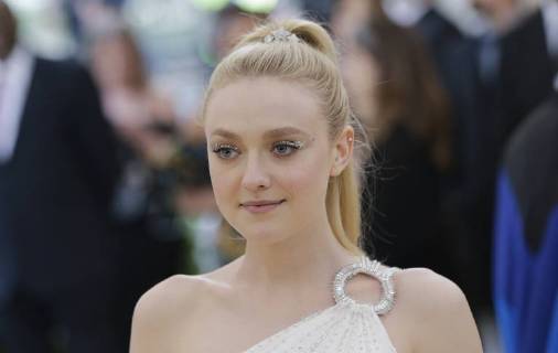 Dakota Fanning arrives on the red carpet at The Metropolitan Museum of Art s Costume Institute Benefit Heavenly Bodies: Fashion and the Catholic Imagination at Metropolitan Museum of Art in New York City on May 7, 2018.  NYP20180507812 JOHNxANGELILLO
