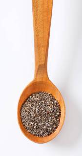 spoon of healthy chia seeds on white background CTKPhotoF201805161198501 