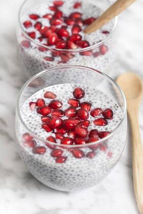 Two glasses of chia pudding with pomegranate seed  RTBF01150