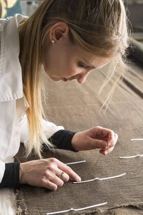 Restoration Studio Restorer Woman Sewing Mark Paper Strip Ready Support Fabric on Lenten Munich Bavaria Germany Europe Copyright: imageBROKER/JohannesxGeyer ibljog04672272.jpg
