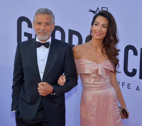 Honoree George Clooney and his wife, human rights attorney Amal Clooney arrive for American Film Institute s 46th annual Life Achievement Award tribute gala at the Dolby Theatre in the Hollywood section of Los Angeles on June 7, 2018.  LAP2018060725 JIMxRUYMEN