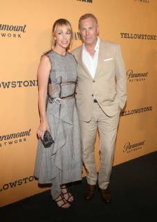LOS ANGELES, CA - JUNE 11: Christine Baumgartner and Kevin Costner at the premiere of Yellowstone at Paramount Studios in Los Angeles, California on June 11, 2018. Copyright: xFayexSadoux