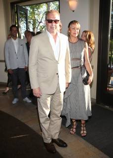 LOS ANGELES, CA - JUNE 11:Christine Baumgartner and Kevin Costner at the premiere of Yellowstone at Paramount Studios in Los Angeles, California on June 11, 2018. Copyright: xFayexSadoux