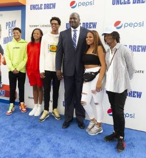 USA: Uncle Drew New York Premiere Shaquille O Neal (C) with his family attends the Uncle Drew New York Premiere at Alice Tully Hall Lincoln Center New York New York United States Alice Tully Hall Lincoln Center  LevxRadin