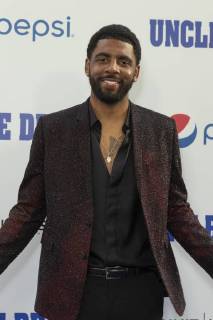USA: Uncle Drew New York Premiere Kyrie Irving attends the Uncle Drew New York Premiere at Alice Tully Hall Lincoln Center New York New York United States Alice Tully Hall Lincoln Center  LevxRadin
