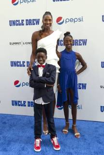 USA: Uncle Drew New York Premiere Lisa Leslie & children Michael Joseph Lockwood II, Lauren Jolie Lockwood attend the Uncle Drew New York Premiere at Alice Tully Hall Lincoln Center New York New York United States Alice Tully Hall Lincoln Center  LevxRadin