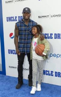 USA: Uncle Drew New York Premiere Nate Robinson and his daughter attend the Uncle Drew New York Premiere at Alice Tully Hall Lincoln Center New York New York United States Alice Tully Hall Lincoln Center  LevxRadin