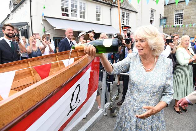 . 16 07 2018. Fowey, United Kingdom. Prince Charles the Duchess of Cornwall visit Cornwall. The Duke and Duchess of Cornwall visit the celebration of Fowey festival meeting local businesses, representatives from Fowey gig club and members of the RNLI on Fowey Quay.  xAndrewxParsonsx xi-Imagesx IIM-18220-0005