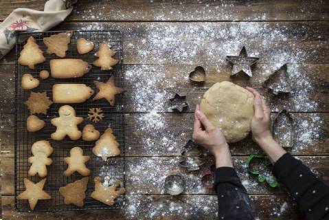 Woman s hands kneading dough for gingerbread cookies model released Symbolfoto  SKCF00469