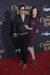 July 30, 2018 - U.S. - 30 July 2018 - Burbank, California - John Stamos, Caitlin McHugh. Premiere of Disney s Christopher Robin held at Walt Disney Studios. Photo Credit: PMA AdMedia U.S. - ZUMAa123 20180730_zaa_a123_252 Copyright: xPmax