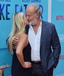 Cast member Kelsey Grammer and his wife Kayte Walsh attend the premiere of the motion picture comedy Like Father at the ArcLight Cinema Dome in the Hollywood section of Los Angeles on July 31, 2018. The storyline follows a workaholic woman who is left at the altar takes her honeymoon trip anyway with her overachieving father who left her mother because he believed his family was holding back his career.  LAP2018073115 JIMxRUYMEN