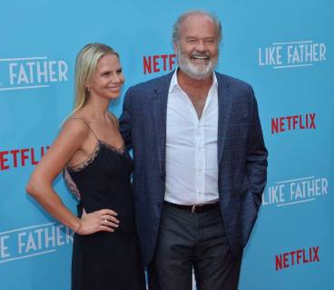 Cast member Kelsey Grammer and his wife Kayte Walsh attend the premiere of the motion picture comedy Like Father at the ArcLight Cinema Dome in the Hollywood section of Los Angeles on July 31, 2018. The storyline follows a workaholic woman who is left at the altar takes her honeymoon trip anyway with her overachieving father who left her mother because he believed his family was holding back his career.  LAP2018073199 JIMxRUYMEN