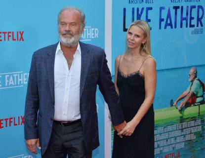 Cast member Kelsey Grammer and his wife Kayte Walsh attend the premiere of the motion picture comedy Like Father at the ArcLight Cinema Dome in the Hollywood section of Los Angeles on July 31, 2018. The storyline follows a workaholic woman who is left at the altar takes her honeymoon trip anyway with her overachieving father who left her mother because he believed his family was holding back his career.  LAP2018073130 JIMxRUYMEN