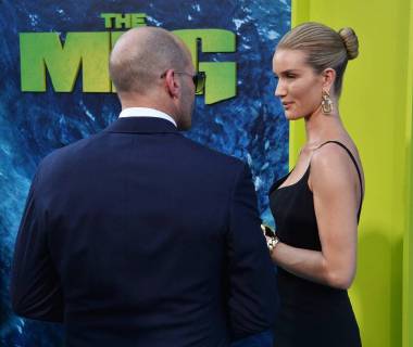 Cast member Jason Statham and his partner, English actress and model Rosie Huntington-Whiteley attend the premiere of the sci-fi motion picture thriller The Meg at TCL Chinese Theatre in the Hollywood section of Los Angeles on August 6, 2018. Storyline: After escaping an attack by what he claims was a 70-foot shark, Jonas Taylor must confront his fears to save those trapped in a sunken submersible.  LAP2018080641 JIMxRUYMEN