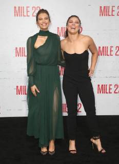 LOS ANGELES, CA - AUGUST 9: Lauren Cohan and Ronda Rousey at the Mile 22 premiere at The Regency Village Theatre in Los Angeles, California on August 9, 2018. Copyright: xFayexSadoux