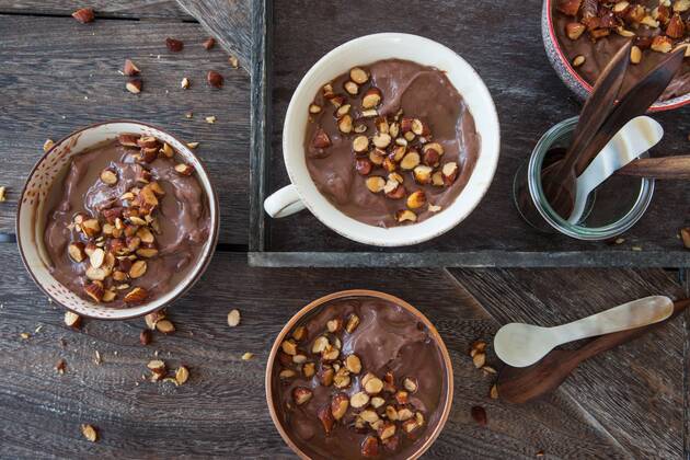 Delicious chocolate pudding with almonds and caramel sauce Chocolate pudding with roasted almonds  1079705184