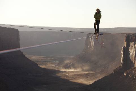 Andy Lewis highlining in Moab Utah, Moab Utah United States Copyright: JaredxAlden 4517100004