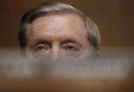 U.S. Senator Lindsey Graham (R-SC) listens during a Senate Judiciary Committee confirmation hearing with professor Christine Blasey Ford, who has accused U.S. Supreme Court nominee Brett Kavanaugh of a sexual assault in 1982, on Capitol Hill in Washington, U.S., September 27, 2018.  WAX20180927323 JIMxBOURG
