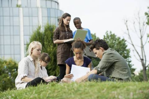 University students studying together outdoors  Copyright: OdilonxDimier B67177812