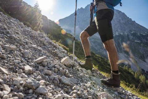 Austria, Tyrol, Young man hiking in the mountains model released Symbolfoto  DIGF04770