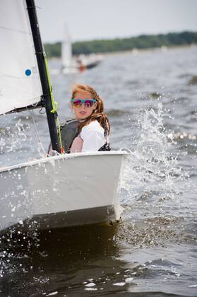 Young girl sailing in boat, Bristol Rhode Island USA model released Symbolfoto Copyright: CatexBrown BRCA001131