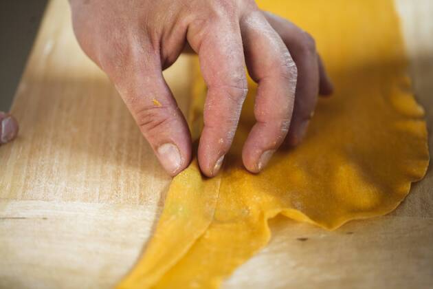 Close-up Of Man Shaping Homemade Fresh Pasta, Bologna, Italy, Bologna Emila Romagna Italy Copyright: ClayxMcLachlan MCCL000313