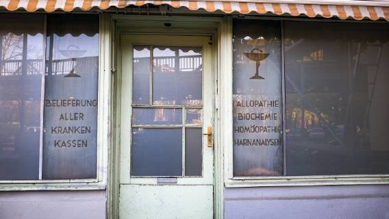Berlin Schöneberg Bülowstraße Bülowbogen former pharmacy with advertising for homeopathy Berlin Schöneberg