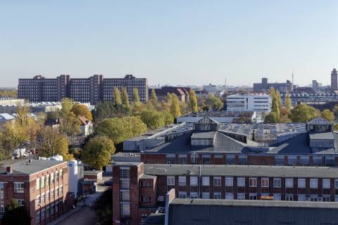 Siemens in Berlin Siemensstadt 2018 10 31 Berlin Germany Berlin Siemensstadt with Siemens branch management Dynamo and Schaltwerk With Berlins support, Siemens plans to set up a campus for science, research and production here and to invest around 600 million euros in this over the next few years